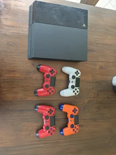 Base PS4 upgraded with 1TB internal Harddrive and 4 controllers