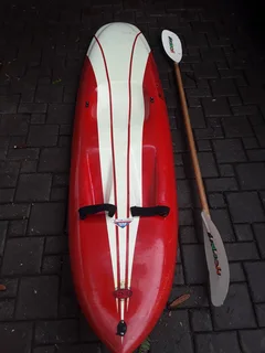 Black Widow single kayak with paddle