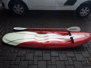 Black Widow single kayak with paddle