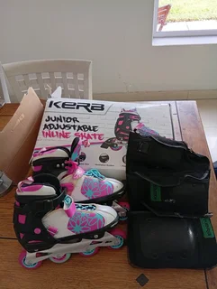 Brand new Kerb rollerblades & padding set