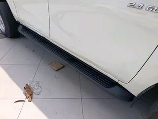 Toyota hilux gd6 oem style side steps available at automotive customs kzn