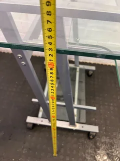 Stylish Glass-Top Mobile Console Table with Silver Frame- A52970