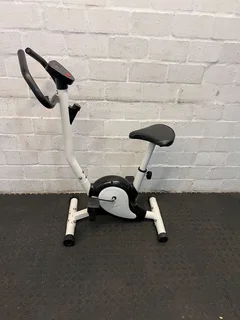 Compact White Exercise Bike with Minor Wear – Perfect for Home Workouts- A52769