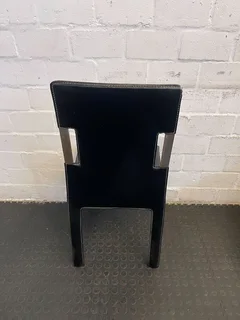 Sleek Black Faux Leather Dining Chair with Minor Wear - REDUCED- A53400