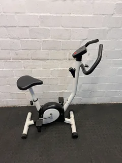 Compact White Exercise Bike with Minor Wear – Perfect for Home Workouts- A52769