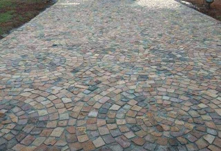 Cobble half brick paving and tar surfacing