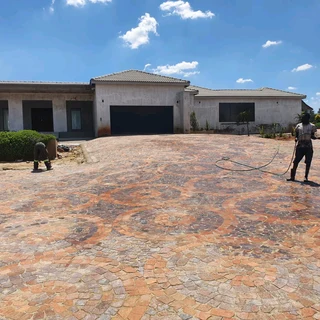 Cobble half brick paving and tar surfacing