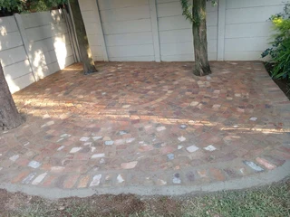 Cobble half brick paving and tar surfacing