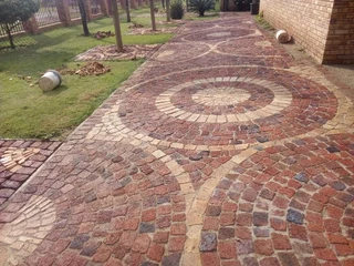 Cobble half brick paving and tar surfacing