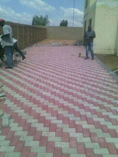 Brick paving and tar surfacing