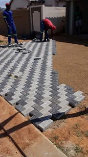 Brick paving and tar surfacing