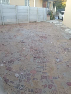 Cobble half brick paving and tar surfacing