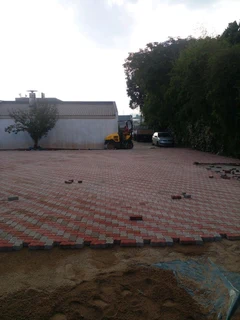 Brick paving and tar surfacing