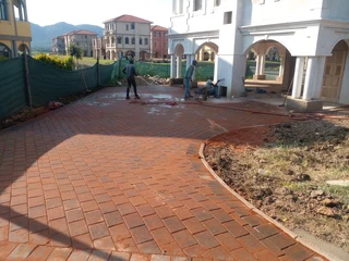 Brick paving and tar surfacing