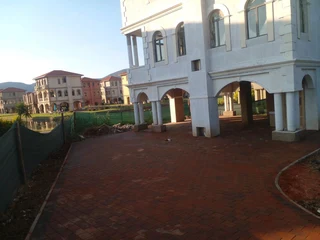 Brick paving and tar surfacing