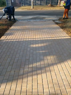 Brick paving and tar surfacing