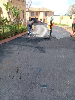 Tar surfacing and tennis courts