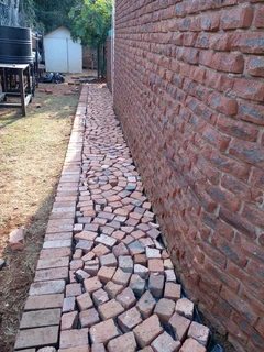 Tar surfacing and tennis courts