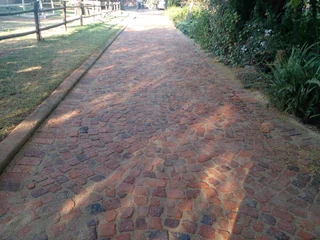 Tar surfacing and tennis courts