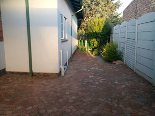 Cobble half brick paving and tar surfacing