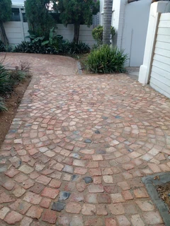 Cobble half brick paving and tar surfacing