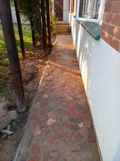 Cobble half brick paving and tar surfacing