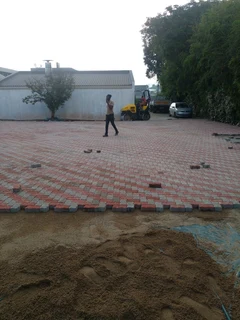 Brick paving and tar surfacing