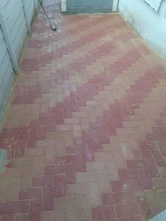 Brick paving and tar surfacing