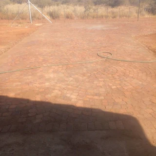 Cobble half brick paving and tar surfacing