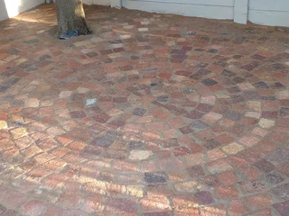 Cobble half brick paving and tar surfacing