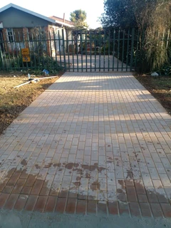 Brick paving and tar surfacing