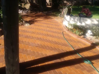 Brick paving and tar surfacing
