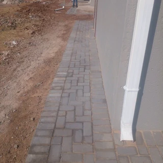 Brick paving and tar surfacing