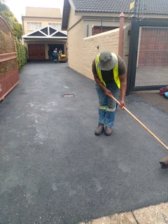 Brick paving and tar surfacing
