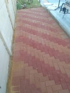 Brick paving and tar surfacing