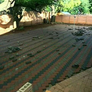 Brick paving and tar surfacing