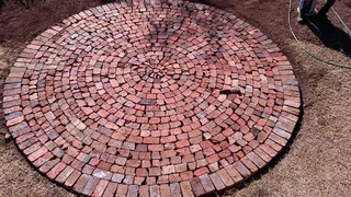 Cobble half brick paving and tar surfacing