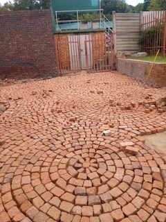 Cobble half brick paving and tar surfacing