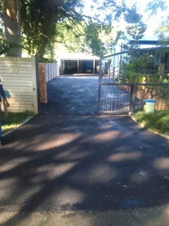 Tar surfacing and tennis courts