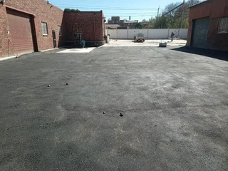 Tar surfacing and tennis courts