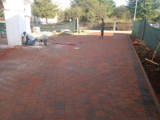 Brick paving and tar surfacing