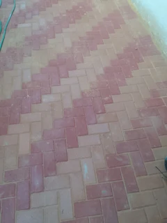 Brick paving and tar surfacing