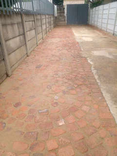 Brick paving and tar surfacing