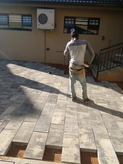 Brick paving and tar surfacing