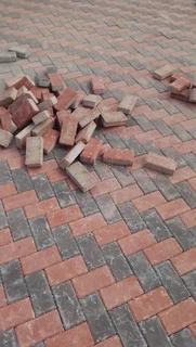Brick paving and tar surfacing