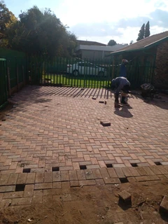 Brick paving and tar surfacing