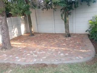 Cobble half brick paving and tar surfacing