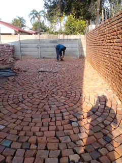 Cobble half brick paving and tar surfacing