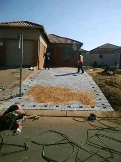 Brick paving and tar surfacing