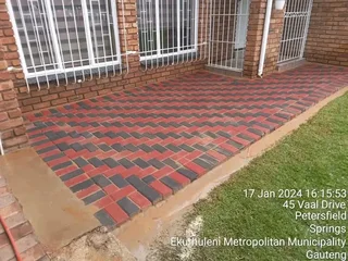 Brick paving and tar surfacing